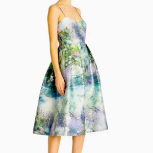 Garden Print Metallic Spaghetti
Strap Midi Cocktail Dress
ML MONIQUE LHUILLIER
